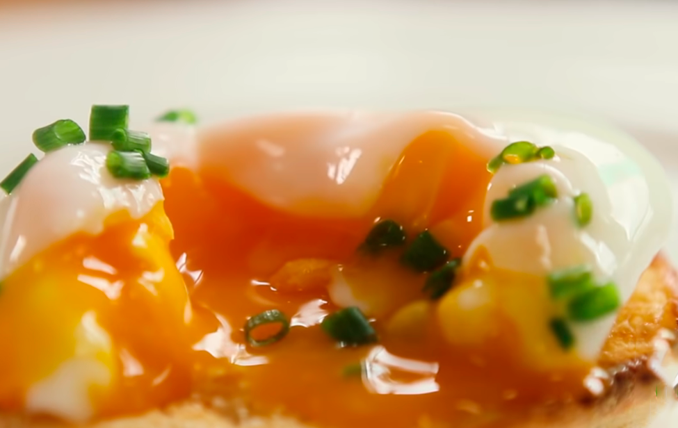 over medium egg yolk with chives on top