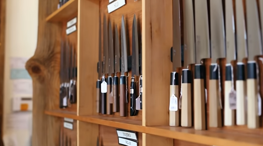 Several knives placed in a display case